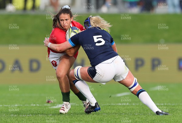 091022 - Wales v Scotland, Women’s Rugby World Cup 2021 Pool A - Kayleigh Powell of Wales takes on Sarah Bonar of Scotland
