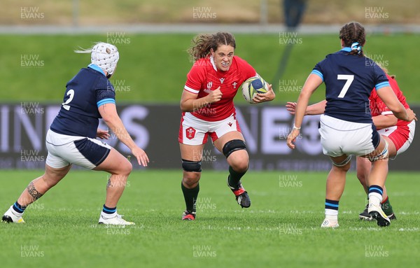 091022 - Wales v Scotland, Women’s Rugby World Cup 2021 Pool A - Natalia John of Wales charges at Louise McMillan of Scotland
