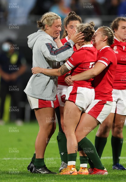 091022 - Wales v Scotland, Women’s Rugby World Cup 2021 Pool A - Alisha Butchers of Wales congratulates Keira Bevan of Wales on the winning kick