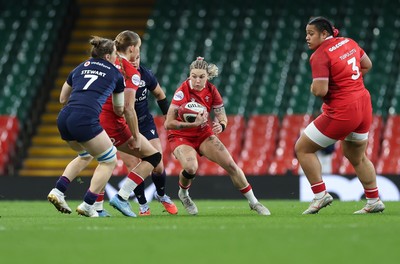 110426 - Wales v Scotland, Guinness Women’s 6 Nations - Keira Bevan of Wales breaks away