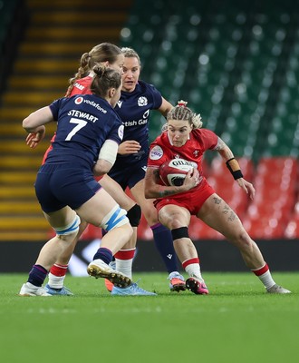 110426 - Wales v Scotland, Guinness Women’s 6 Nations - Keira Bevan of Wales breaks away