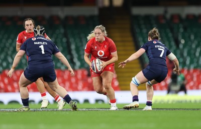 110426 - Wales v Scotland, Guinness Women’s 6 Nations - Kelsey Jones of Wales takes on Leah Bartlett of Scotland and Alex Stewart of Scotland