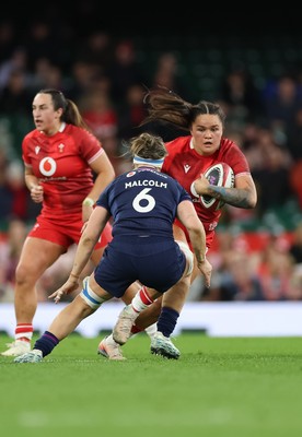 110426 - Wales v Scotland, Guinness Women’s 6 Nations - Jorja Aiono of Wales takes on Rachel Malcolm of Scotland