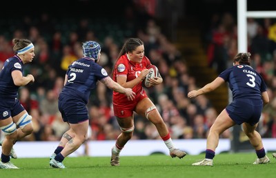 110426 - Wales v Scotland, Guinness Women’s 6 Nations - Jorja Aiono of Wales takes on Rachel Malcolm of Scotland and Lana Skeldon of Scotland