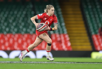 110426 - Wales v Scotland, Guinness Women’s 6 Nations - Keira Bevan of Wales charges forward