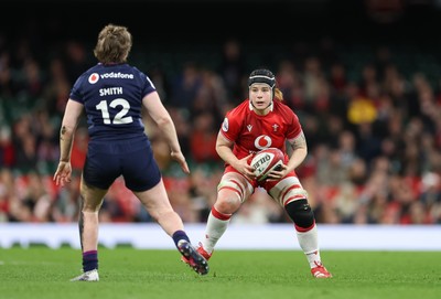 110426 - Wales v Scotland, Guinness Women’s 6 Nations - Bethan Lewis of Wales takes on Meryl Smith of Scotland