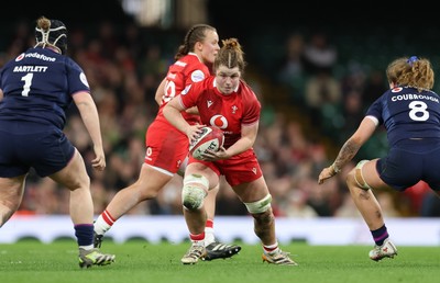 110426 - Wales v Scotland, Guinness Women’s 6 Nations - Kate Williams of Wales takes on Leah Bartlett of Scotland  and Emily Coubrough of Scotland