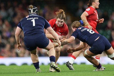 110426 - Wales v Scotland, Guinness Women’s 6 Nations - Kate Williams of Wales takes on Leah Bartlett of Scotland  and Emily Coubrough of Scotland