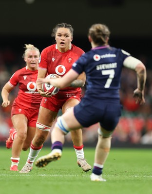 110426 - Wales v Scotland, Guinness Women’s 6 Nations - Jorja Aiono of Wales takes on Alex Stewart of Scotland