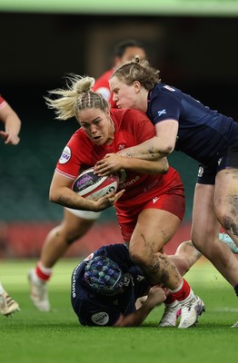 110426 - Wales v Scotland, Guinness Women’s 6 Nations - Kelsey Jones of Wales breaks for the line