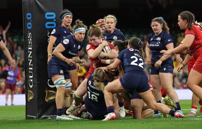 110426 - Wales v Scotland, Guinness Women’s 6 Nations - Kate Williams of Wales powers over to score try