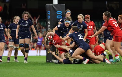 110426 - Wales v Scotland, Guinness Women’s 6 Nations - Kate Williams of Wales powers over to score try