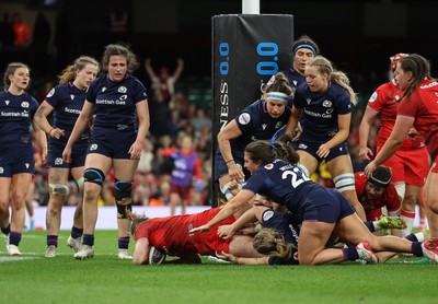 110426 - Wales v Scotland, Guinness Women’s 6 Nations - Kate Williams of Wales powers over to score try