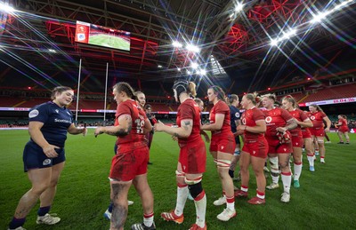 110426 - Wales v Scotland, Guinness Women’s 6 Nations - Players congratulate each other at the end of the match