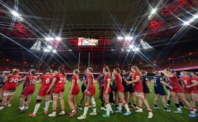 110426 - Wales v Scotland, Guinness Women’s 6 Nations - Players congratulate each other at the end of the match
