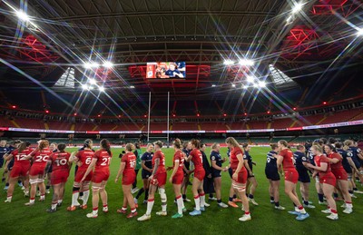 110426 - Wales v Scotland, Guinness Women’s 6 Nations - Players congratulate each other at the end of the match
