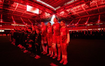 110426 - Wales v Scotland, Guinness Women’s 6 Nations - Wales captain Kate Williams and mascot Nell Rolfe line up for the anthem