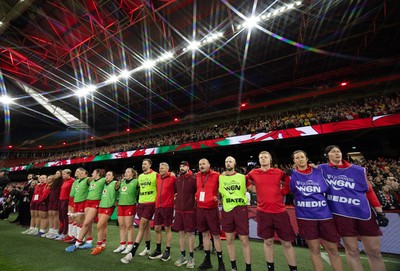 110426 - Wales v Scotland, Guinness Women’s 6 Nations - The Wales management team line up for the anthem 