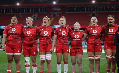 110426 - Wales v Scotland, Guinness Women’s 6 Nations - Wales players, Sisilia Tuipulotu, Donna Rose, Georgia Evans, Hannah Dallavalle, Seren Lockwood, Branwen Metcalfe and Jorja Aiono during the anthem