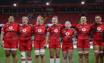 110426 - Wales v Scotland, Guinness Women’s 6 Nations - Wales players, Sisilia Tuipulotu, Donna Rose, Georgia Evans, Hannah Dallavalle, Seren Lockwood, Branwen Metcalfe and Jorja Aiono during the anthem