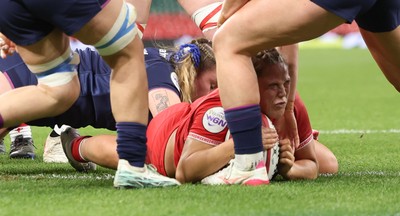 110426 - Wales v Scotland, Guinness Women’s 6 Nations - Kelsey Jones of Wales powers over to score try