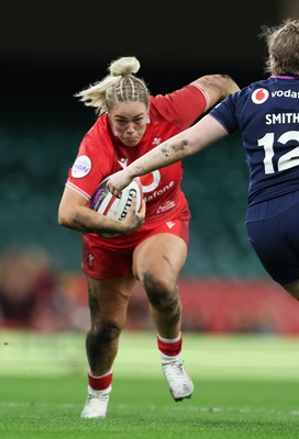 110426 - Wales v Scotland, Guinness Women’s 6 Nations - Kelsey Jones of Wales takes on Meryl Smith of Scotland 