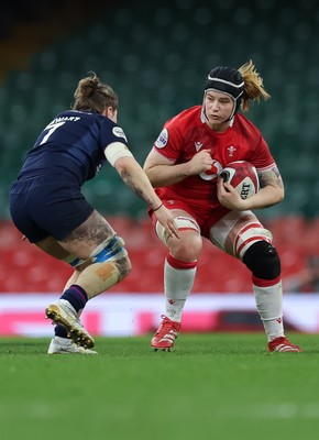 110426 - Wales v Scotland, Guinness Women’s 6 Nations - Bethan Lewis of Wales takes on Alex Stewart of Scotland 