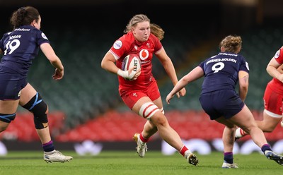 110426 - Wales v Scotland, Guinness Women’s 6 Nations - Alaw Pyrs of Wales takes on Holland Bogan of Scotland and Leia Brebner-Holden of Scotland 