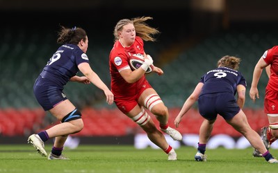 110426 - Wales v Scotland, Guinness Women’s 6 Nations - Alaw Pyrs of Wales takes on Holland Bogan of Scotland and Leia Brebner-Holden of Scotland 