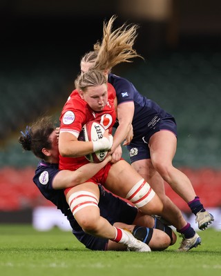 110426 - Wales v Scotland, Guinness Women’s 6 Nations - Alaw Pyrs of Wales takes on Holland Bogan of Scotland and Leia Brebner-Holden of Scotland 