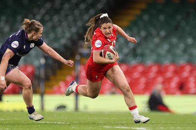 110426 - Wales v Scotland, Guinness Women’s 6 Nations - Kayleigh Powell of Wales breaks away