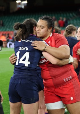 110426 - Wales v Scotland, Guinness Women’s 6 Nations - Sisilia Tuipulotu of Wales with Rhona Lloyd of Scotland  at the end of the match