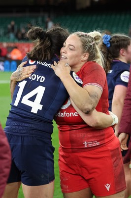 110426 - Wales v Scotland, Guinness Women’s 6 Nations - Kelsey Jones of Wales with Rhona Lloyd of Scotland at the end of the match