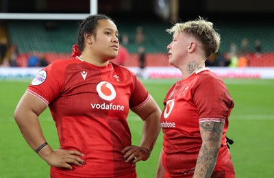 110426 - Wales v Scotland, Guinness Women’s 6 Nations - Sisilia Tuipulotu of Wales and Donna Rose of Wales at the end of the match
