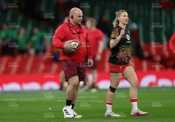 110426 - Wales v Scotland, Guinness Women’s 6 Nations -Sean Lynn, Wales Women head coach and Keira Bevan of Wales during warm up