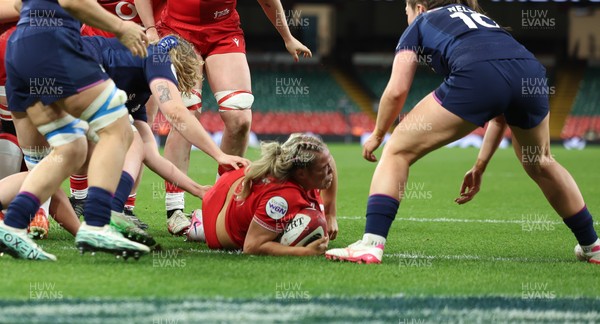 110426 - Wales v Scotland, Guinness Women’s 6 Nations - Kelsey Jones of Wales powers over to score try