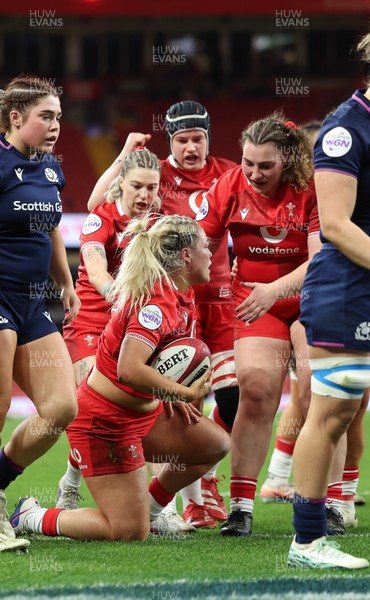 110426 - Wales v Scotland, Guinness Women’s 6 Nations - Kelsey Jones of Wales powers over to score try