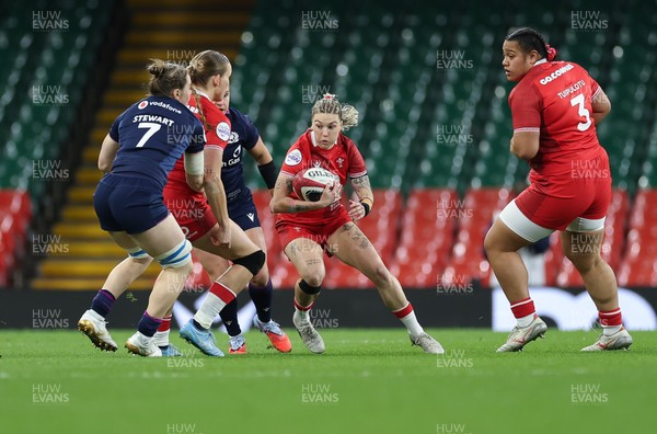 110426 - Wales v Scotland, Guinness Women’s 6 Nations - Keira Bevan of Wales breaks away