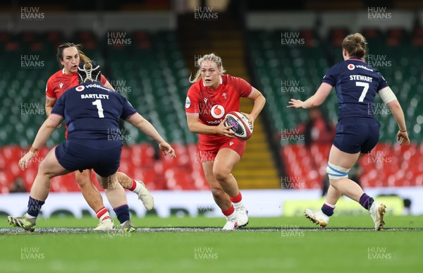 110426 - Wales v Scotland, Guinness Women’s 6 Nations - Kelsey Jones of Wales takes on Leah Bartlett of Scotland and Alex Stewart of Scotland