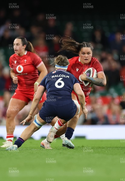 110426 - Wales v Scotland, Guinness Women’s 6 Nations - Jorja Aiono of Wales takes on Rachel Malcolm of Scotland