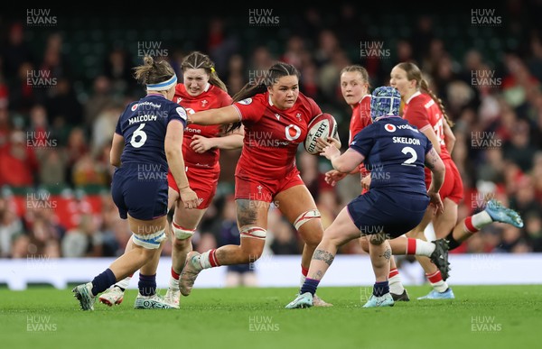 110426 - Wales v Scotland, Guinness Women’s 6 Nations - Jorja Aiono of Wales takes on Rachel Malcolm of Scotland
