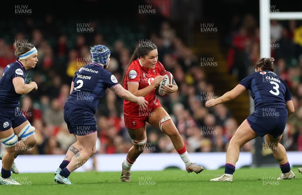 110426 - Wales v Scotland, Guinness Women’s 6 Nations - Jorja Aiono of Wales takes on Rachel Malcolm of Scotland and Lana Skeldon of Scotland