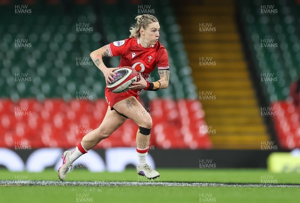 110426 - Wales v Scotland, Guinness Women’s 6 Nations - Keira Bevan of Wales charges forward