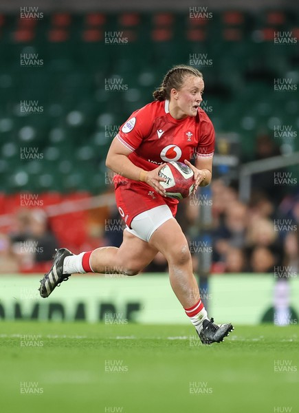 110426 - Wales v Scotland, Guinness Women’s 6 Nations - Lleucu George of Wales charges forward