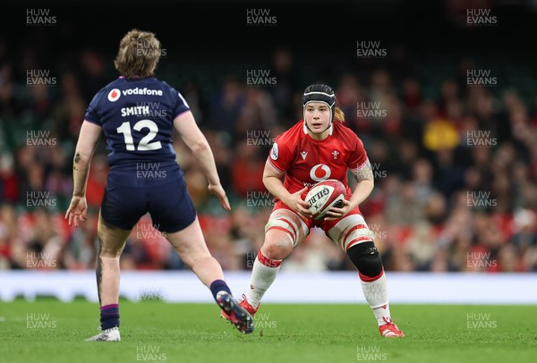 110426 - Wales v Scotland, Guinness Women’s 6 Nations - Bethan Lewis of Wales takes on Meryl Smith of Scotland