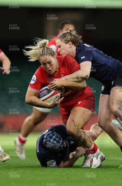110426 - Wales v Scotland, Guinness Women’s 6 Nations - Kelsey Jones of Wales breaks for the line