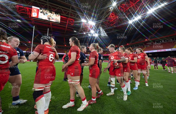 110426 - Wales v Scotland, Guinness Women’s 6 Nations - Players congratulate each other at the end of the match