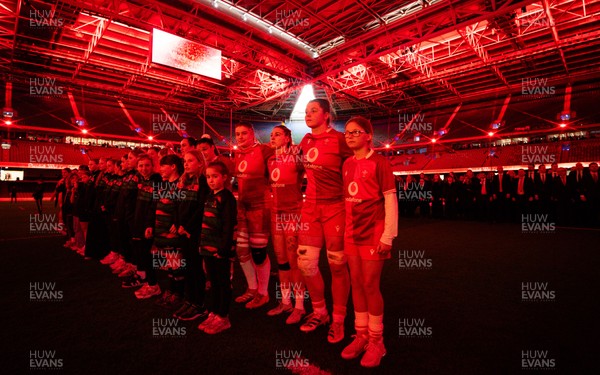 110426 - Wales v Scotland, Guinness Women’s 6 Nations - Wales captain Kate Williams and mascot Nell Rolfe line up for the anthem