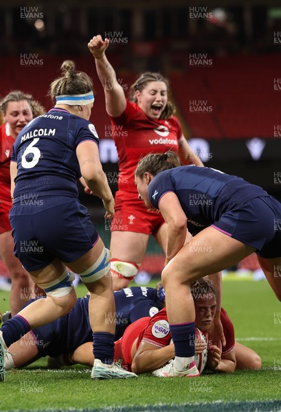 110426 - Wales v Scotland, Guinness Women’s 6 Nations - Kelsey Jones of Wales powers over to score try