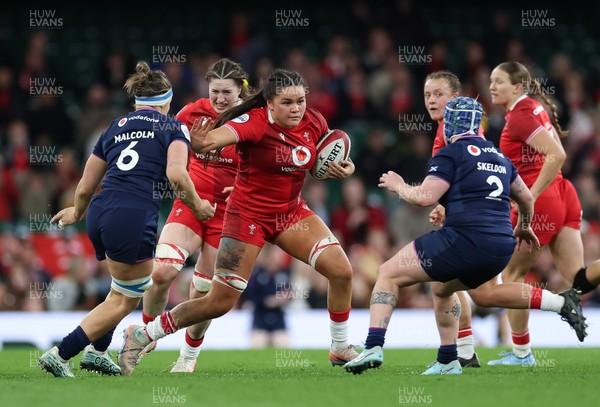 110426 - Wales v Scotland, Guinness Women’s 6 Nations - Jorja Aiono of Wales takes on Rachel Malcolm of Scotland 